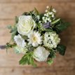 632 Zijden bloemstuk in lila schaal